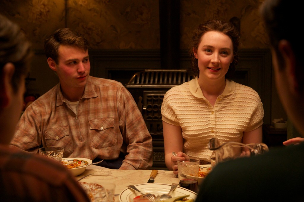 Emory Cohen as "Tony" and Saoirse Ronan as "Eilis" in BROOKLYN. Photo by Kerry Brown. © 2015 Twentieth Century Fox Film Corporation All Rights Reserved